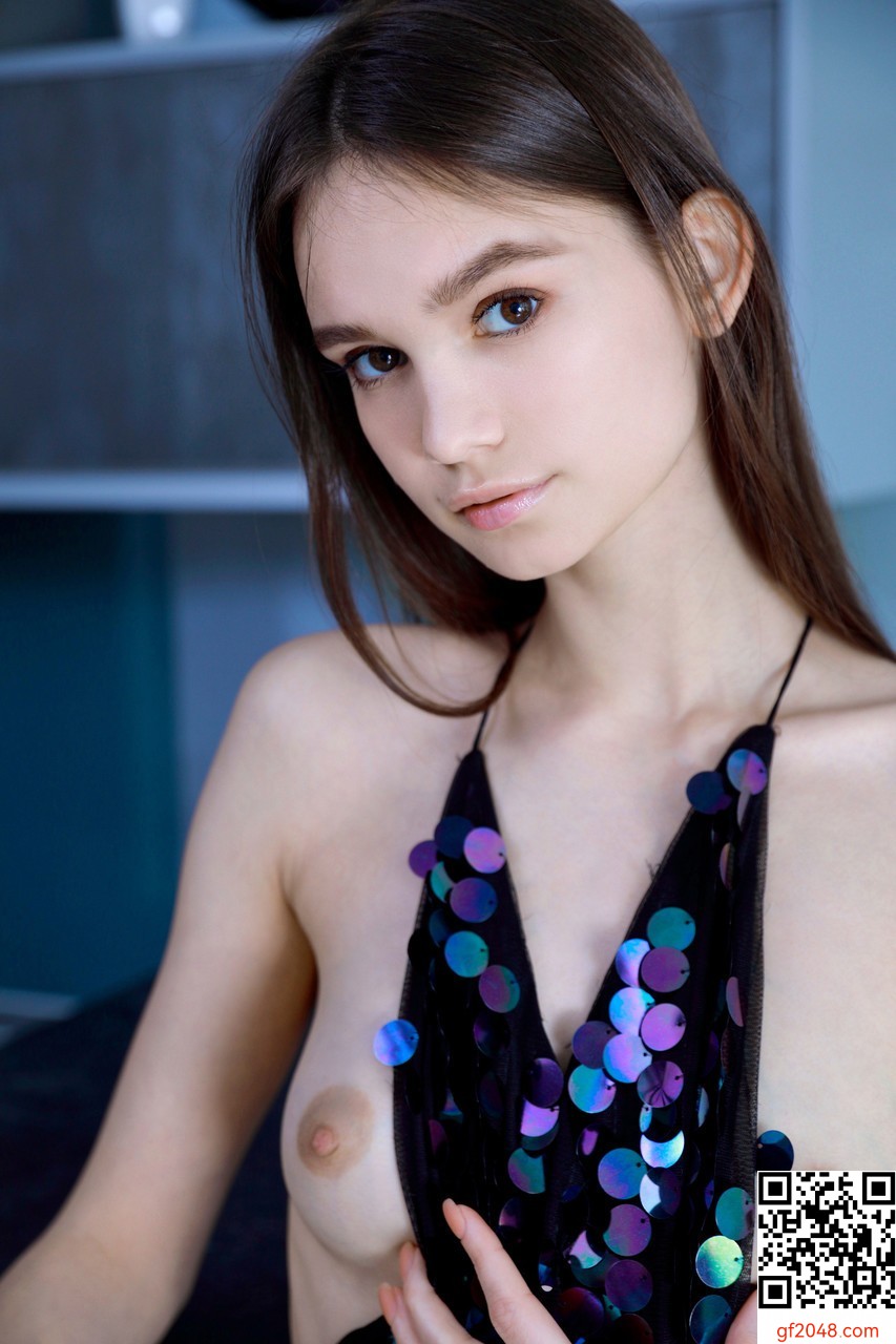 Glamorous babe Anastasia Bella unveils her small tits & her shaved pussy